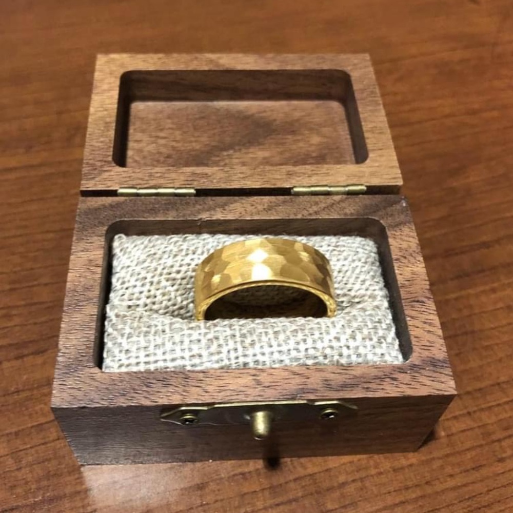 Brand new men’s yellow gold plated tungsten wedding band. Size 9.5